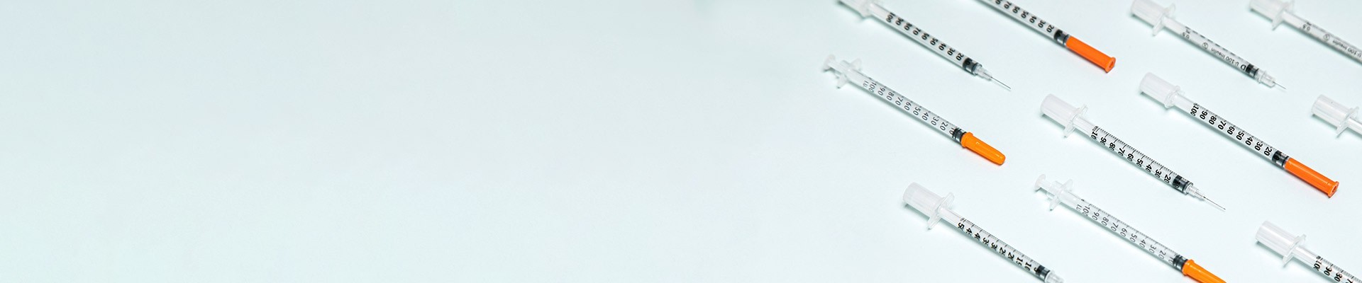 Fixed-needle syringes